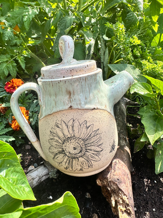 Handmade ceramic teapot with sunflower design 