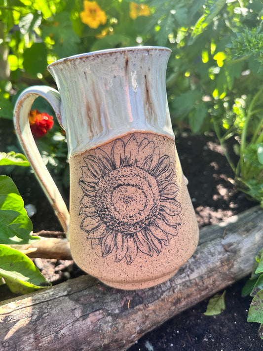 Handmade ceramic mug with sunflower design 
