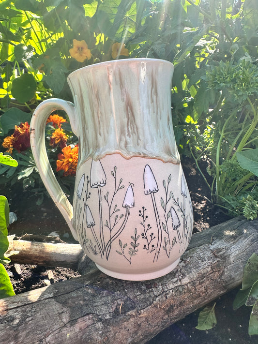 Handmade ceramic mug with mushrooms design 
