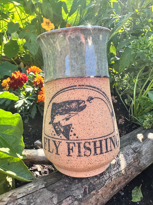 Handmade ceramic mug with fly fishing design